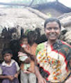 Photo gallery: a smiling woman holding a child