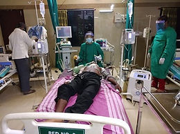 Patient on oxygen in a hospital bed: oxygen concentrators by Swasth saved a patient