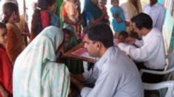 Anganwadi check-up by child specialists Dr. Bharadwaj and Dr. Yavalkar